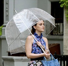 Woman holding a clear umbrella